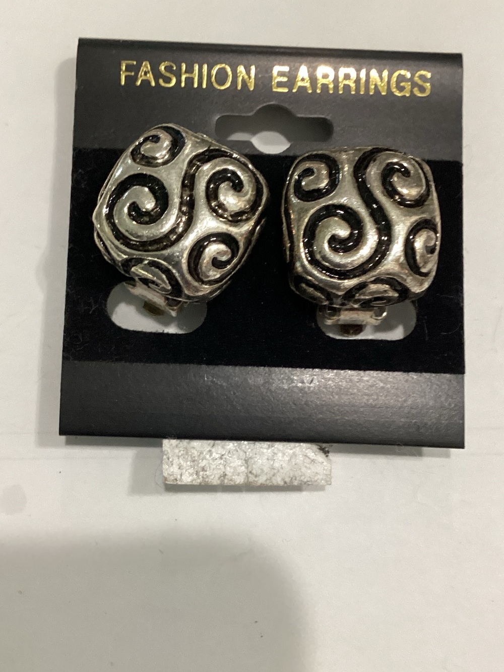 Silver Swirl Clip-On Earrings‎ -